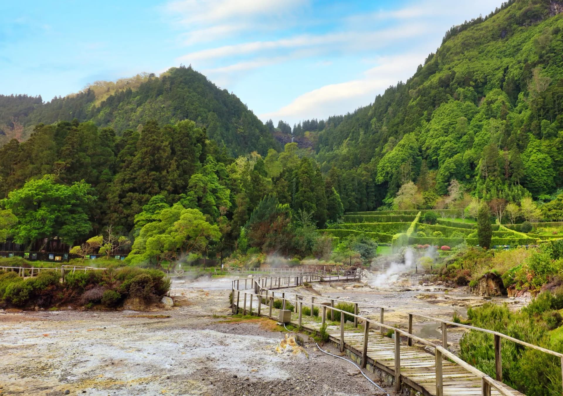Hot and geothermal pools in activity with smoke with park and mountains with forest in the background in the famous Furnas, São Miguel - Azores ... See More