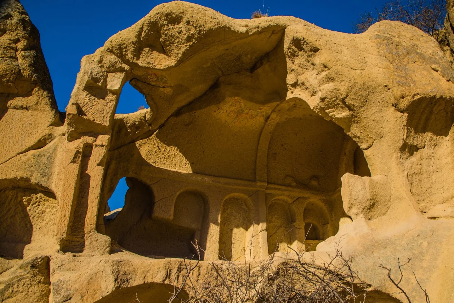 Göreme, Turkey - March 21 2014: Cone shaped Rock formation so called fairy Chimneys in Paşabağ Valley of Cappadocia