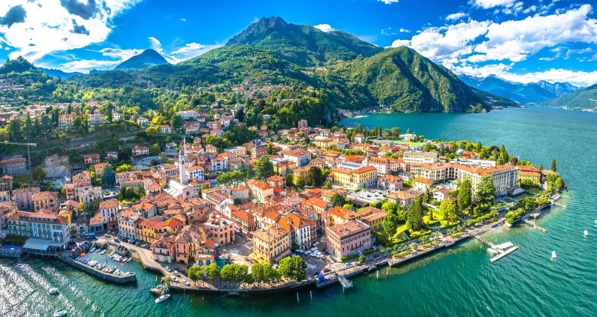 Como Lake and town of Menaggio waterfront aerial panoramic view