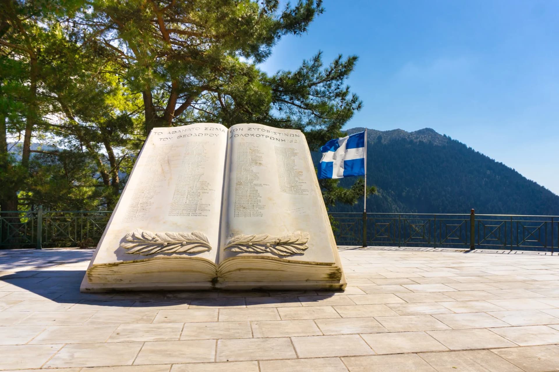 A monument of a marble book commemorating the Greek war of Independence in Zygovisti village of mountainous Arcadia in Peloponnese, Greece
