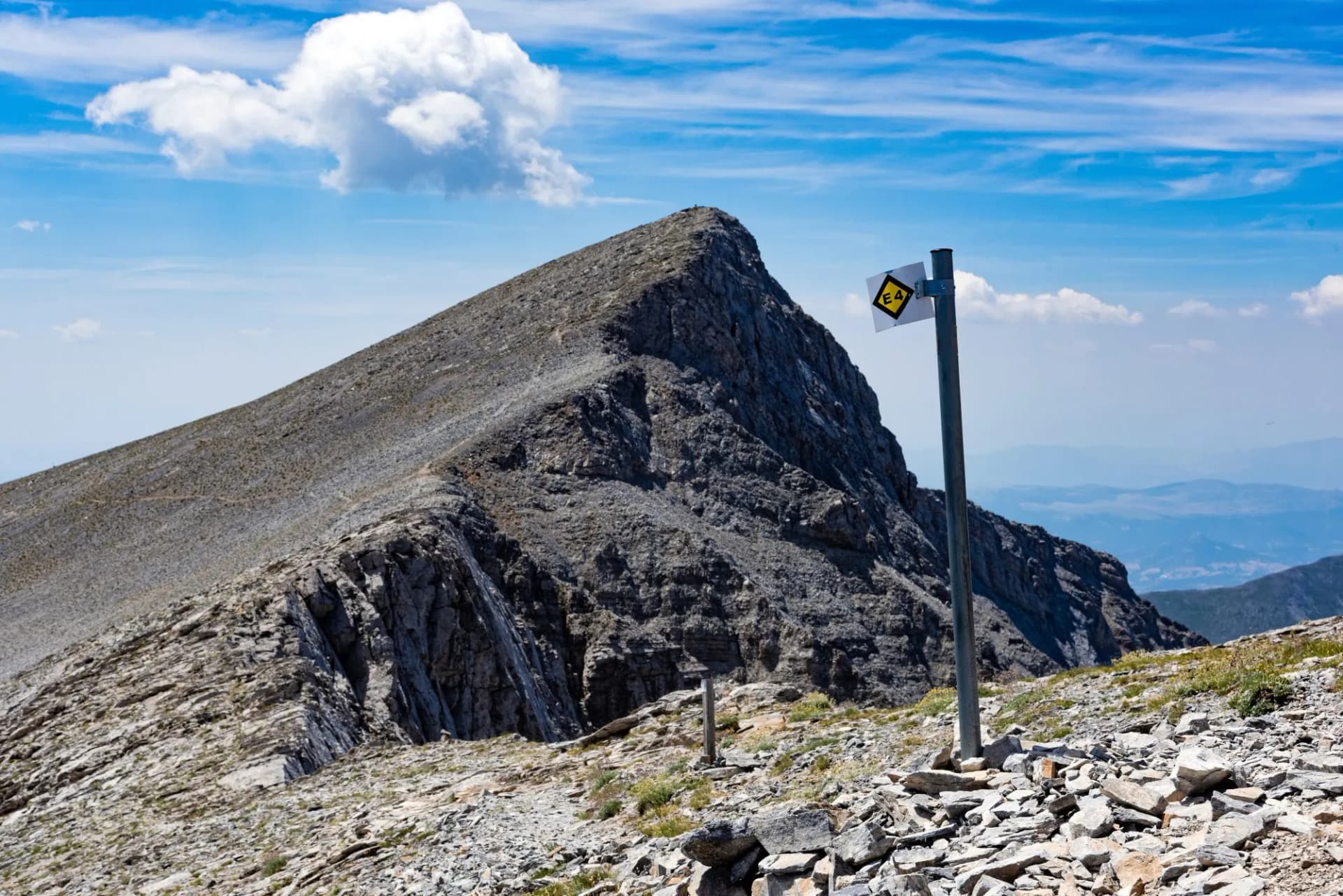 Skolio’s peak rising in Olympus’ heights