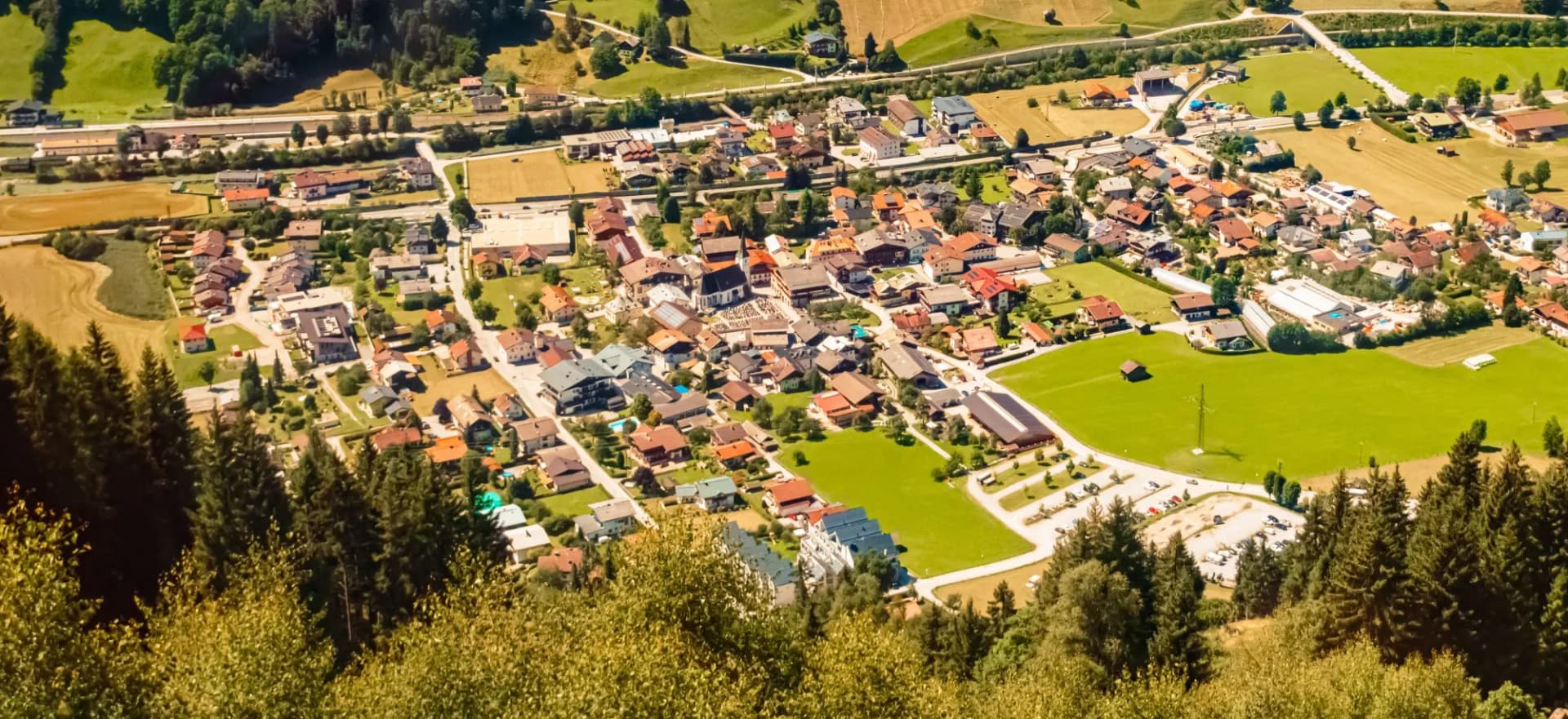 Aerial alpine summer view with a church at Dorfgastein, St. Johann im Pongau, Salzburg, Austria