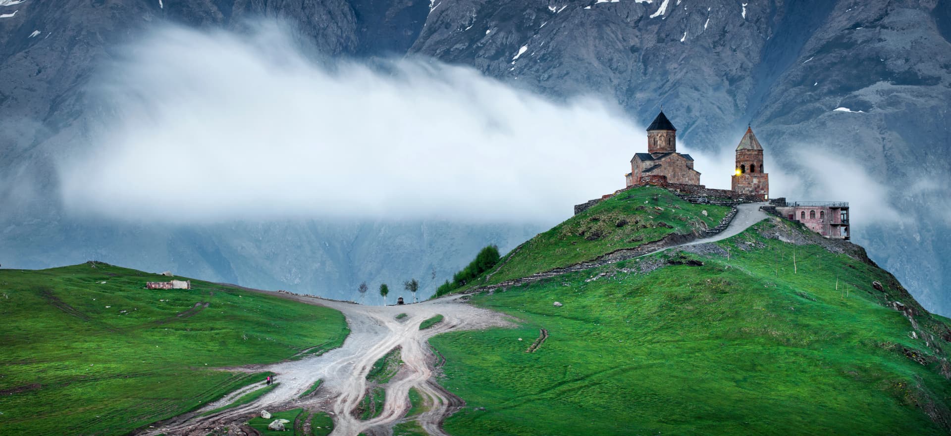 moving clouds behind old church in Georgia