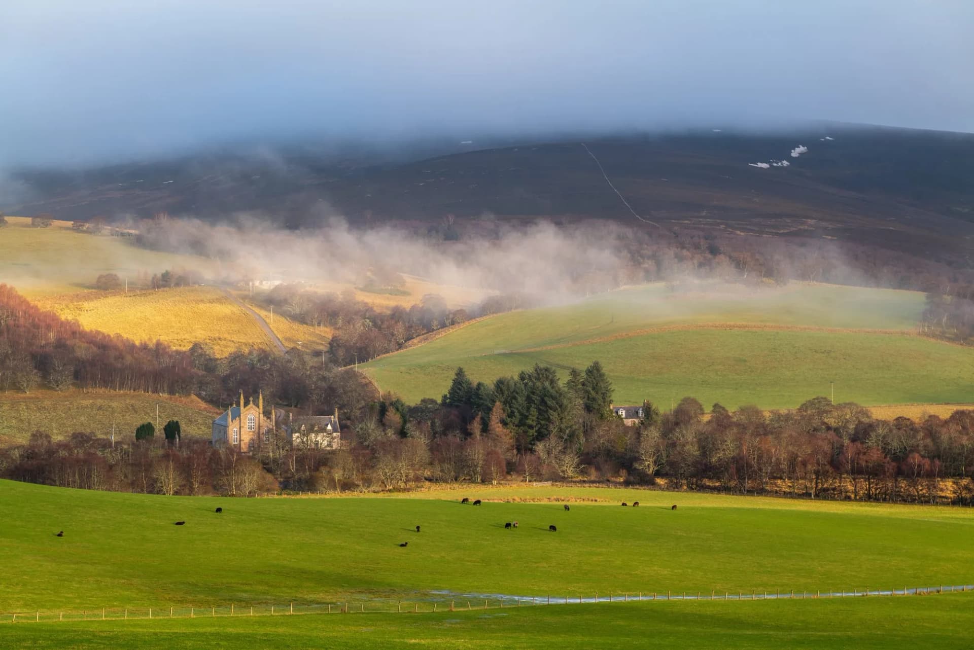 Rolling hills and mysterious fog define Scotland