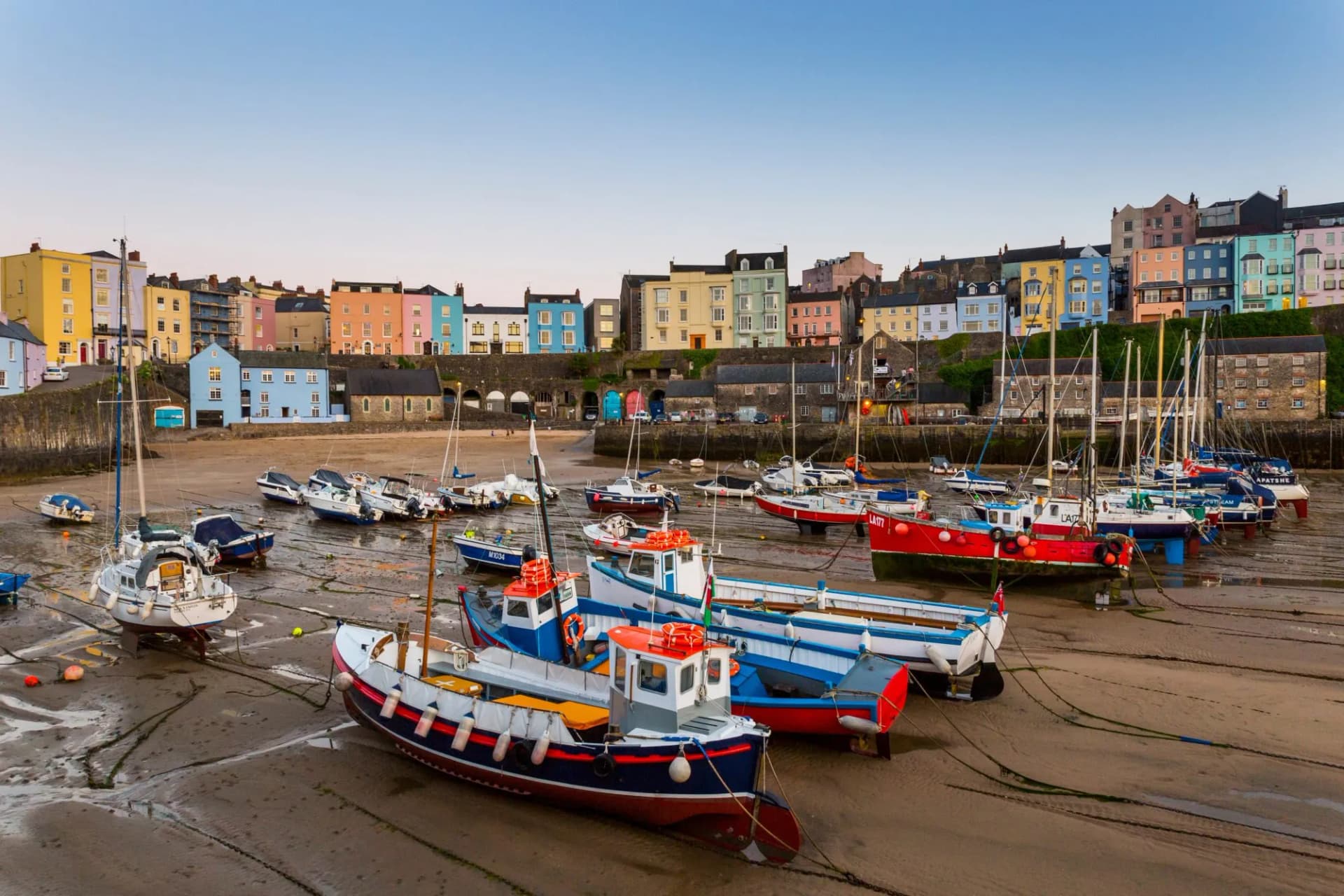 Brightly painted houses line Tenby’s historic harbo
