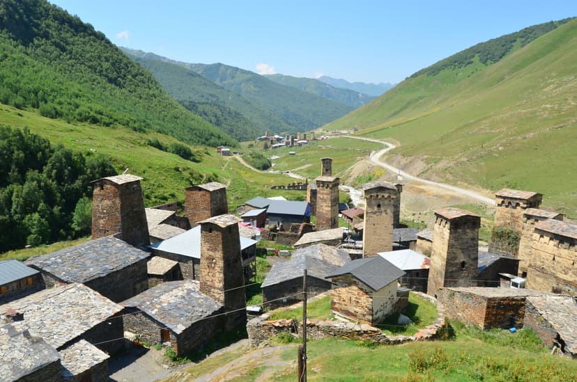Ushguli stone defense towers and village houses in Georgia mountain valley