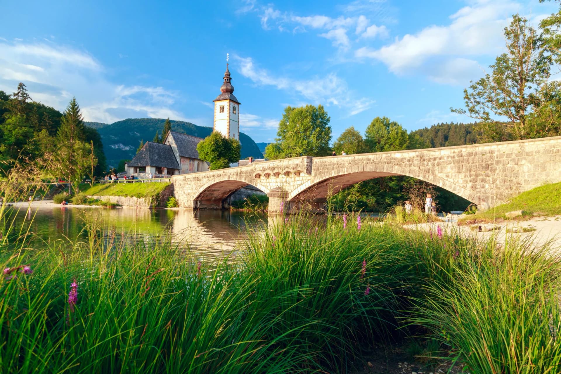 Church of Sv. John the Baptist and a bridge by the Bohinj lake