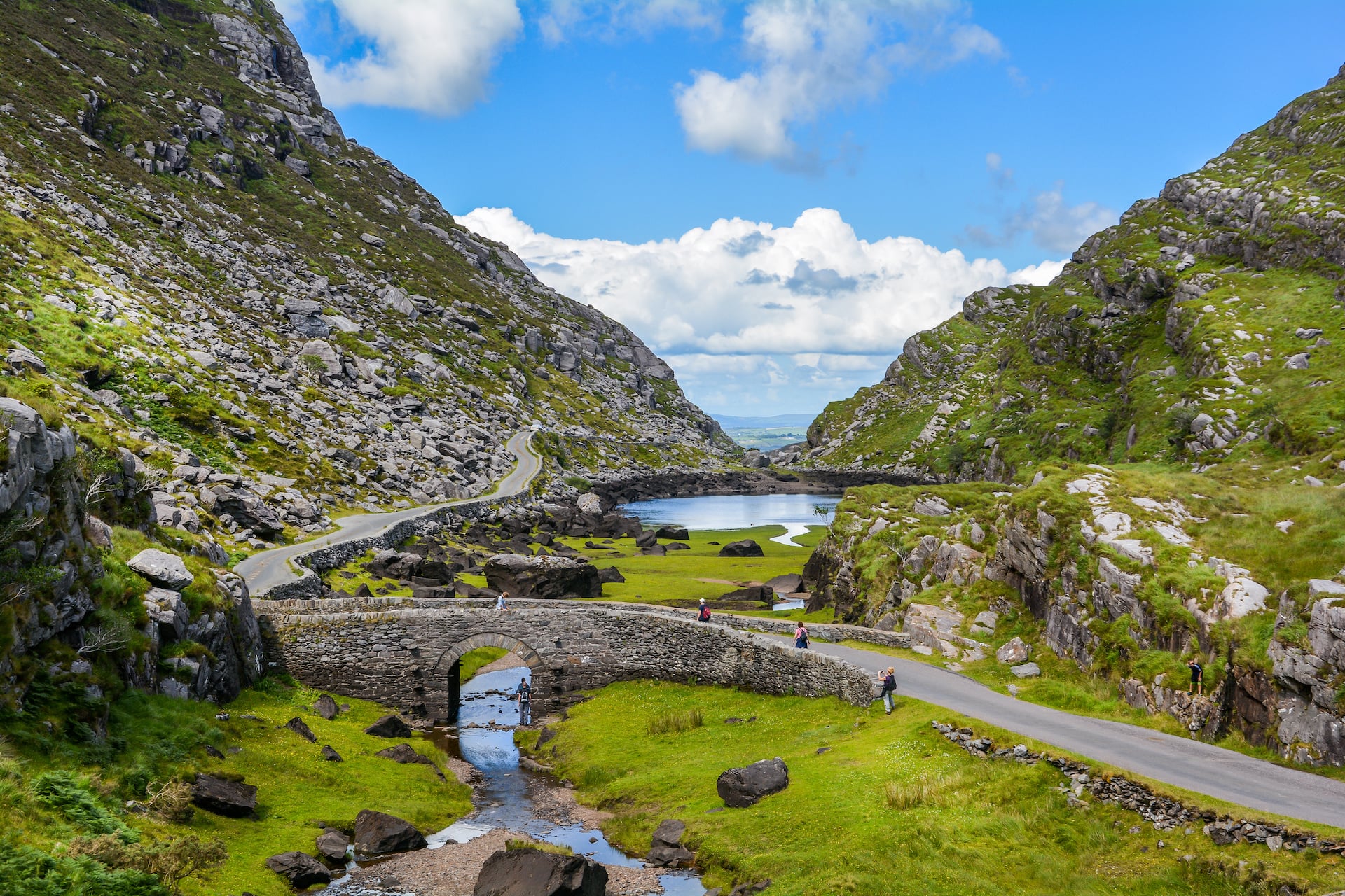 The Gap of Dunloe valley with cloud shadow on the slopes
