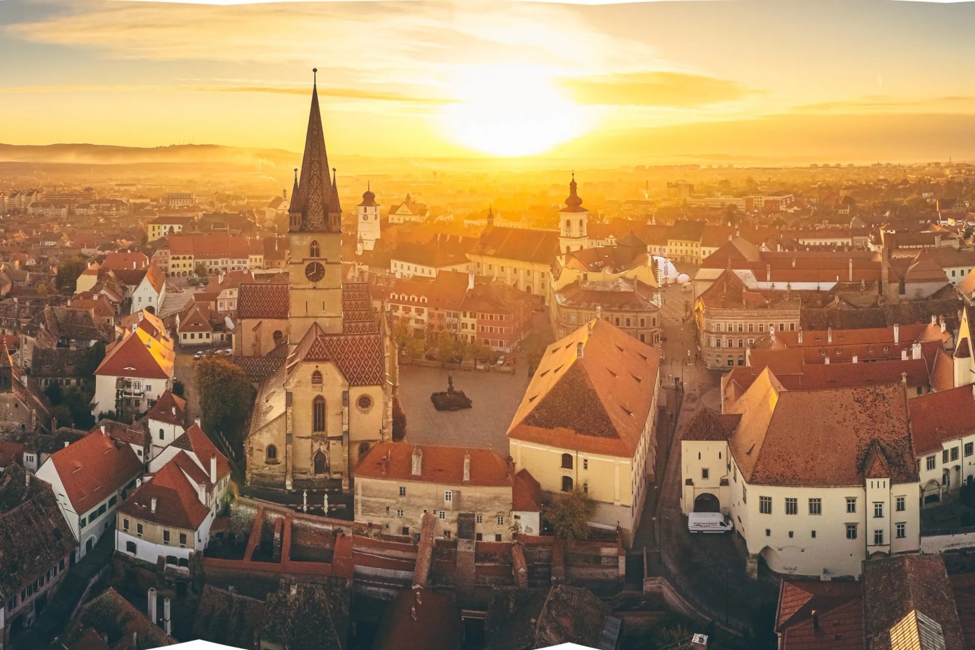 Aerial view over Sibiu city in Transylvania, Romania, during an amazing sunset over the centre old town