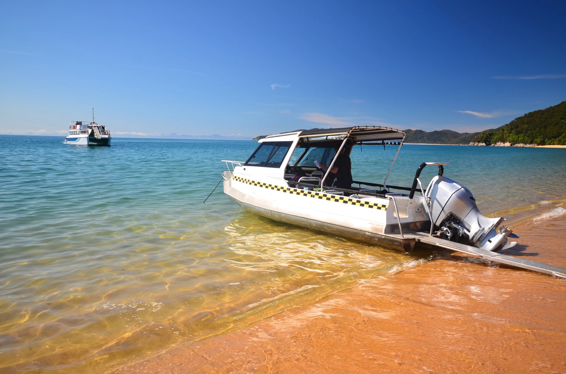 Water taxi on the Abel Tasman coast