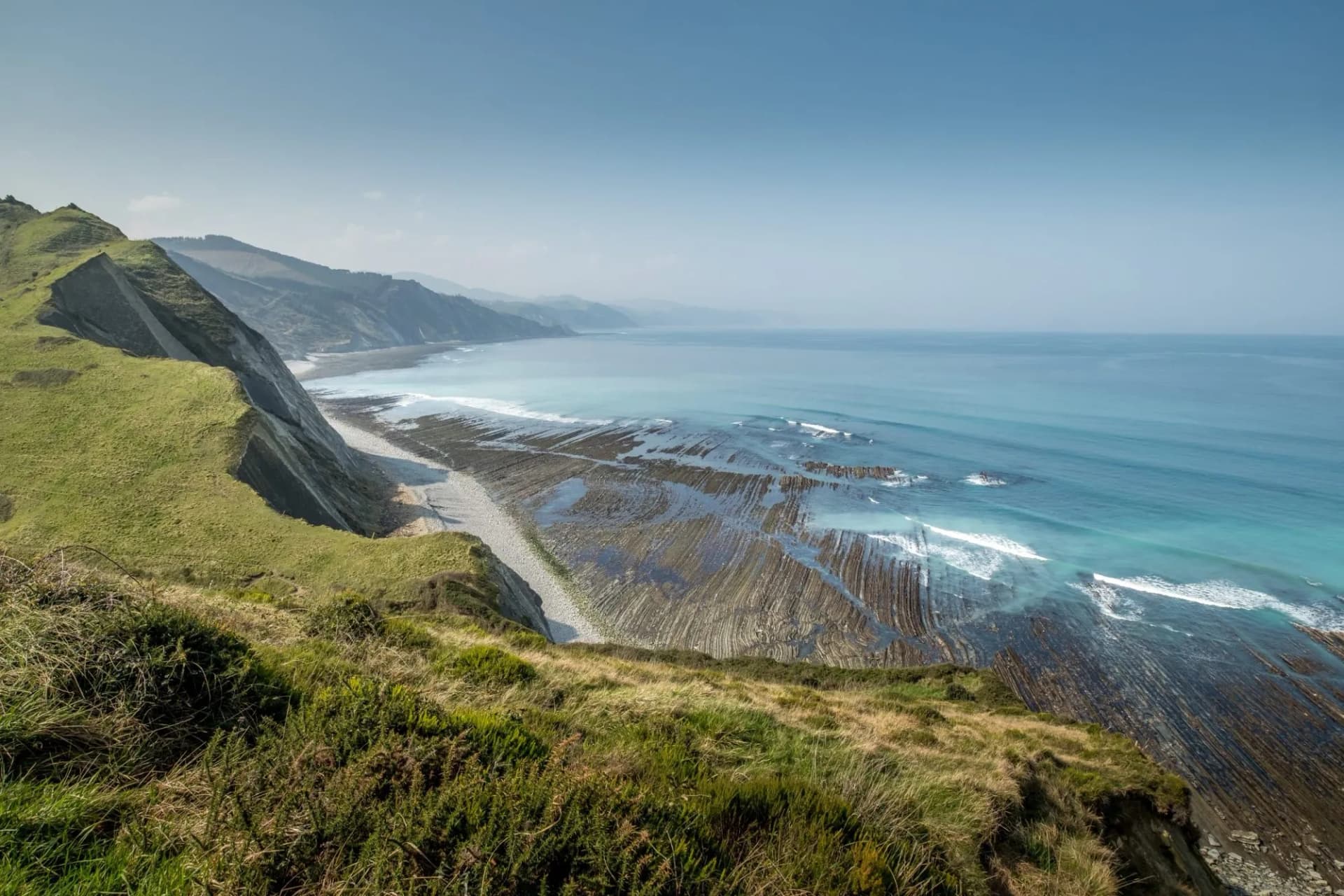 Hiking on the coast between Zumaia and Deba on the Camino del Norte.