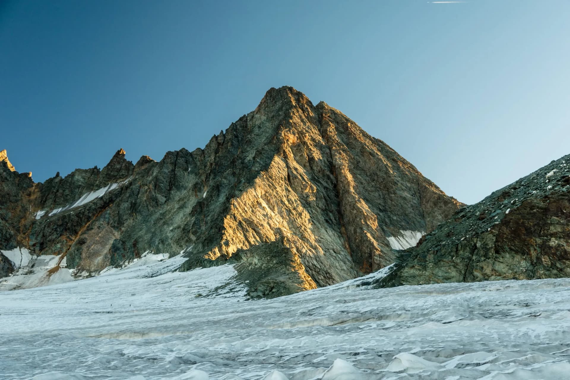 Hiking on glacier to Grossglockner peak via Studlgrat, Tyrol, Austria