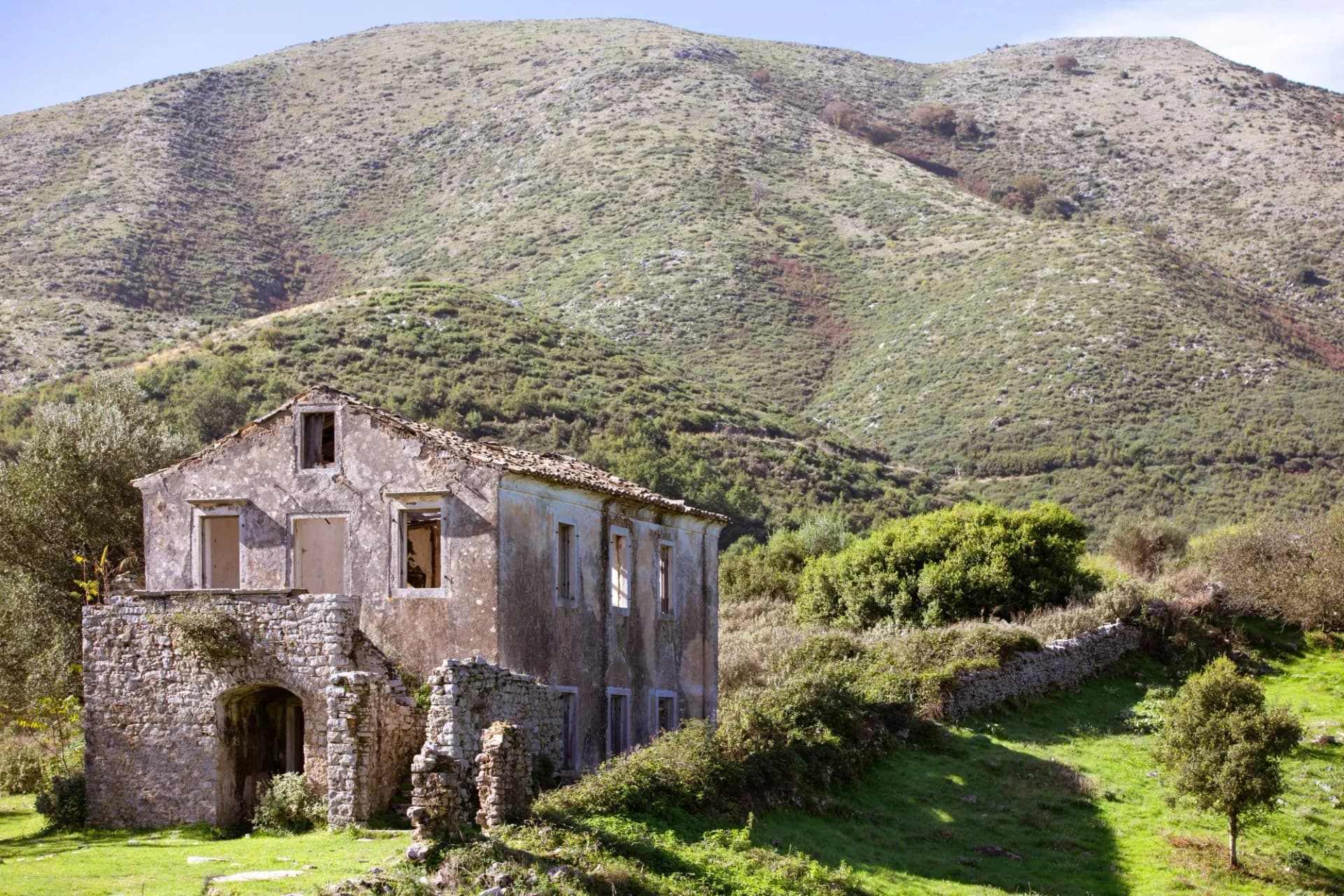 Old Perithia, Corfu's oldest village, incredible ruins of stone build houses, close to Mount Pantokrator, abandoned village of Sinies. Greece.