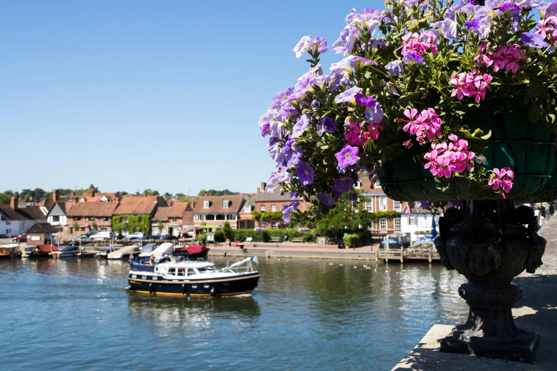 Skyline Of Henley On Thames In Oxfordshire UK With River Thames In Foreground