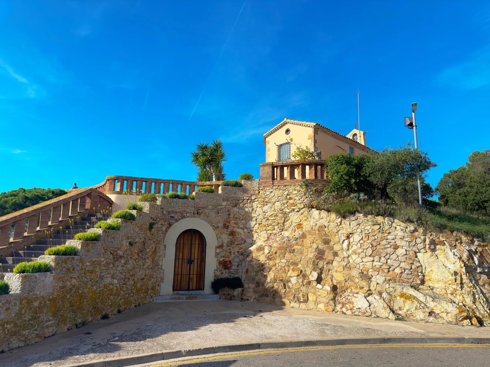 The Ermita de Sant Elm on its terraced hill above Sant Feliu de Guíxols