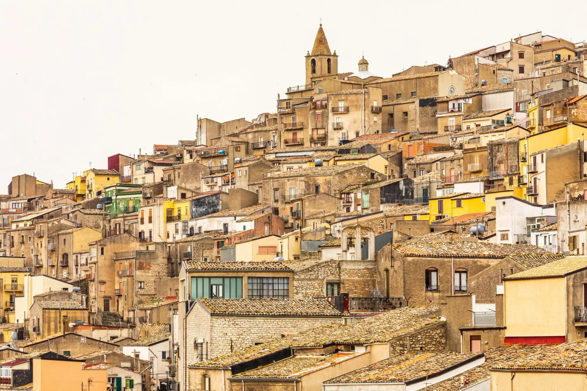 Italy, Sicily, Province of Palermo, Prizzi. View of homes and buildings in the ancient hill town of Prizzi.