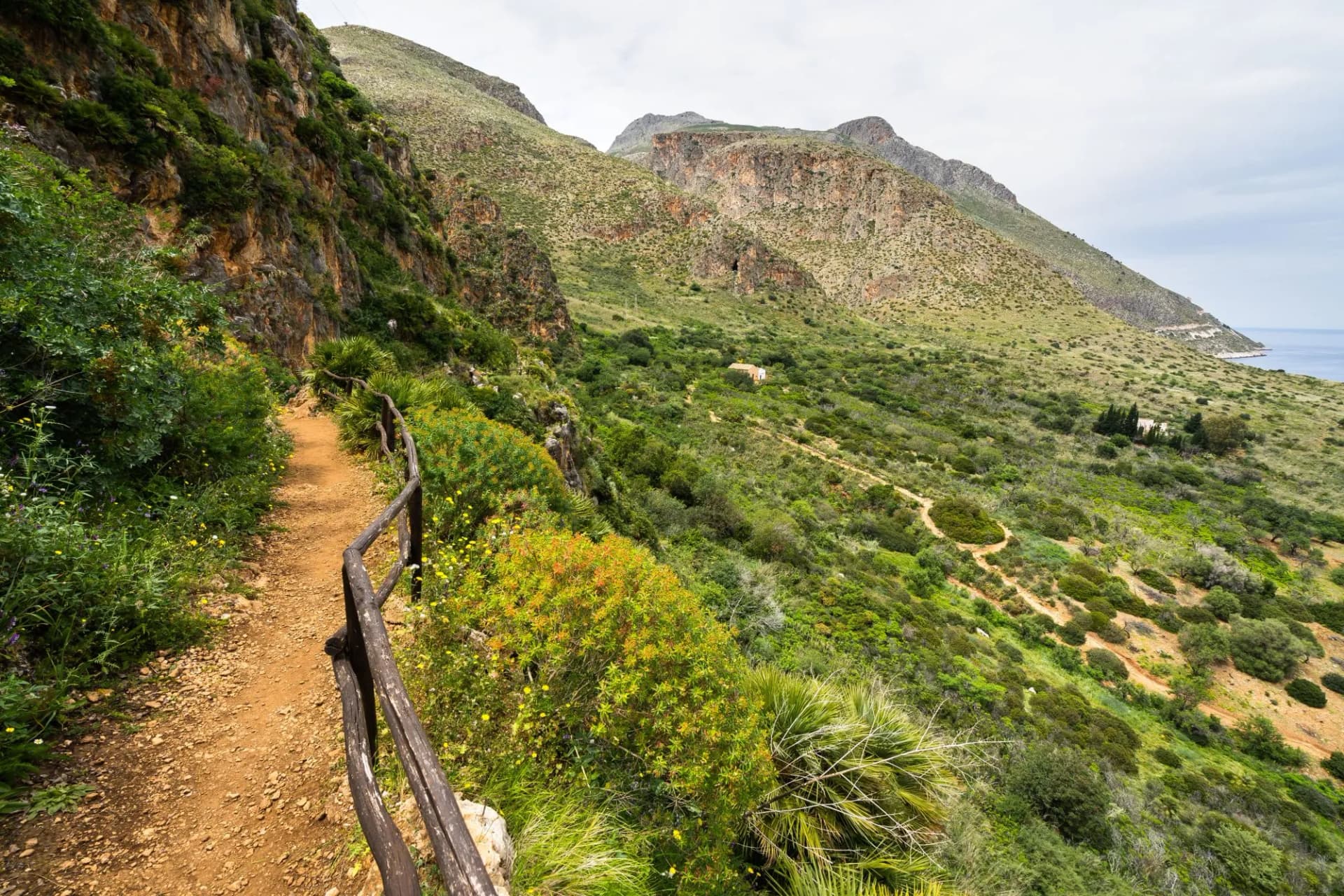 Panoramic hiking trail on the coastline of Gulf of Castellamare at natural reserve "Riserva dello Zingaro", San Vito Lo Capo, Sicily, Italy