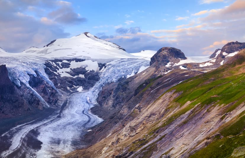 Pasterze glacier and Johannisberg summit at the end of the Grossglockner Alpine road in the Hohe Tauern National Park, Austria. Sunset panorama.