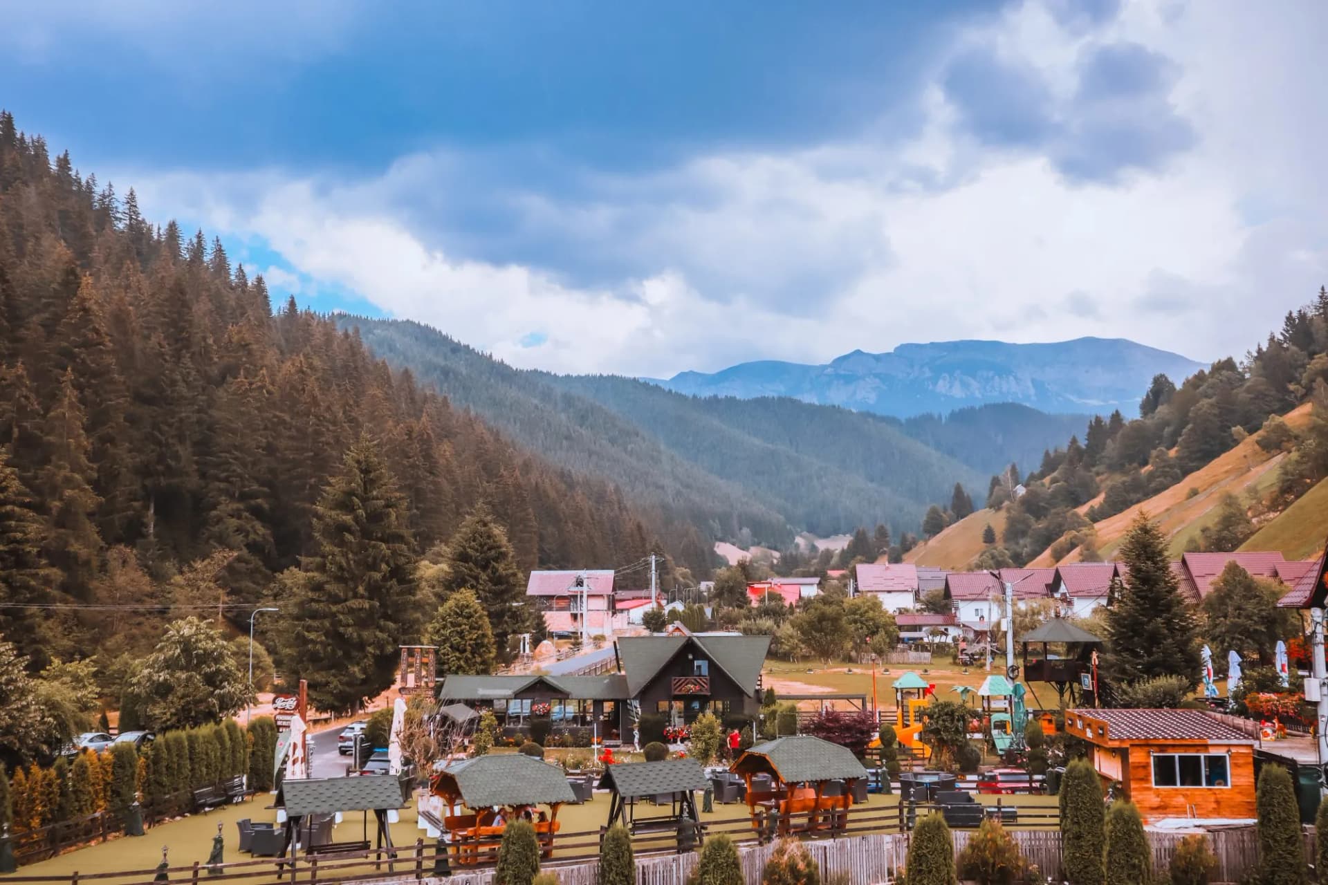 Moeciu de Sus, Romania, 30th of July 2022 - Landscape of mountains and cottage complex