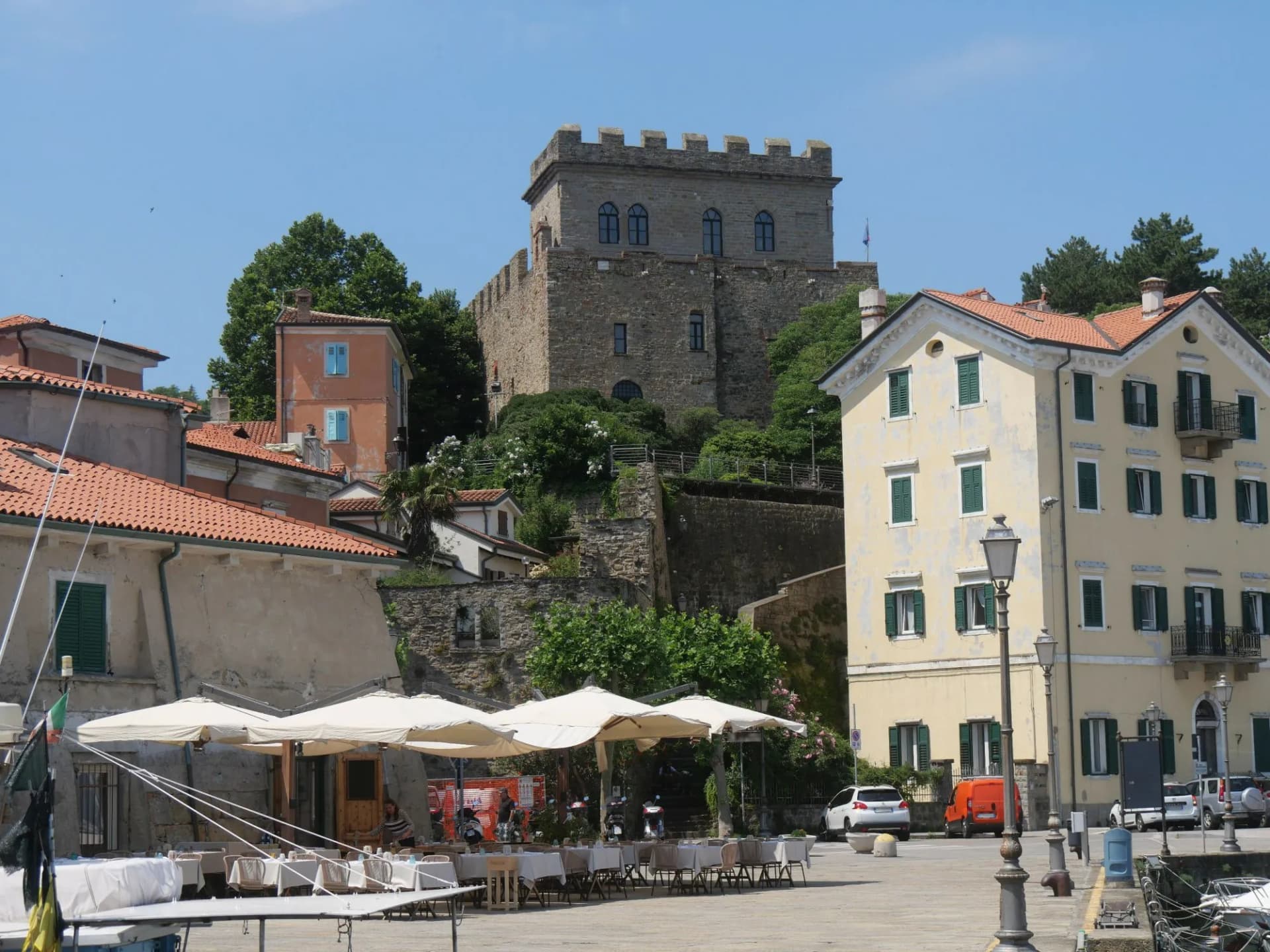 Castle in Muggia : the building was built in a dominant position on the port and it has a stone tower