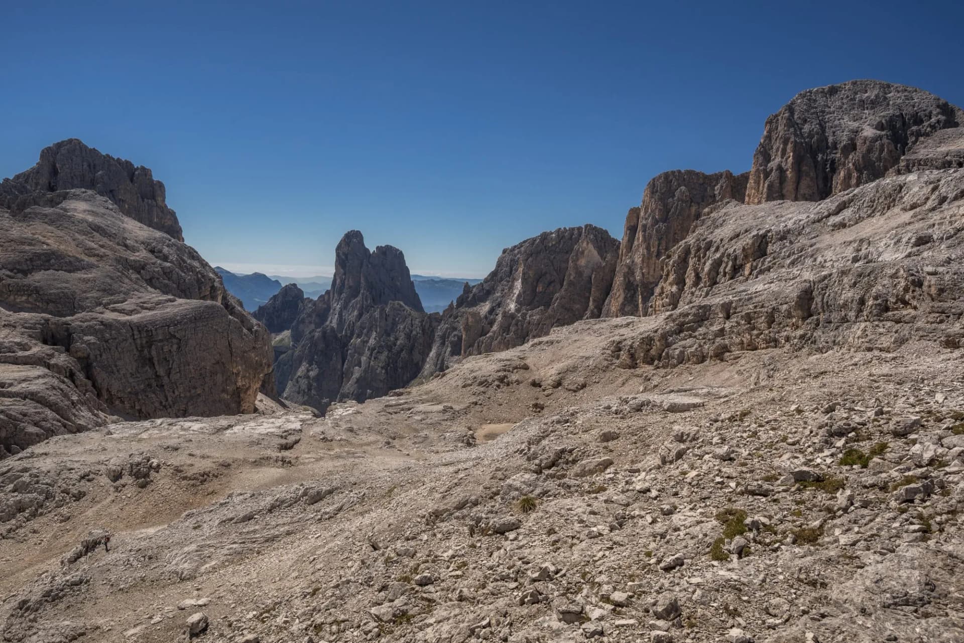 Pale di San Martino mountain group summits from L to R, Cima Canali, Cimerlo, Sass Maor, Cima della Madonna, as seen from Pradidali Basso pass, at the foot of Fradusta glacier, Dolomites, Italy.