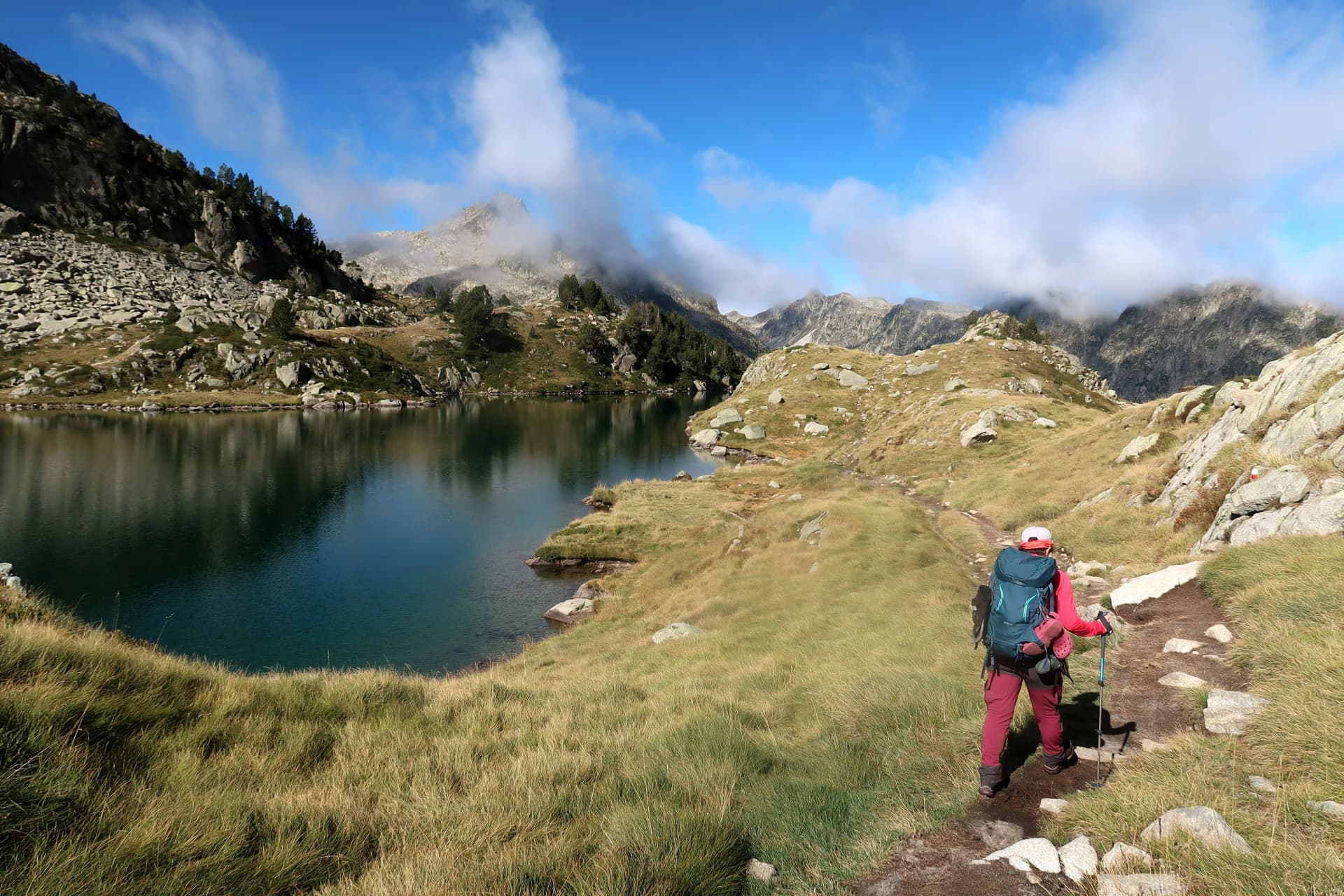 Pyrenees, Carros de Foc hiking tour. A week long hike from hut to hut on a natural scenery with lakes, mountains and amazing flora and fauna.