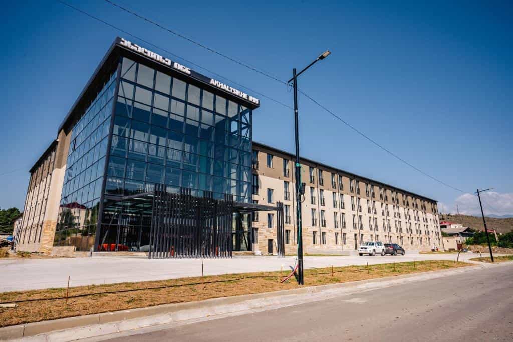 Modern glass and stone hotel building in Akhaltsikhe, Georgia.