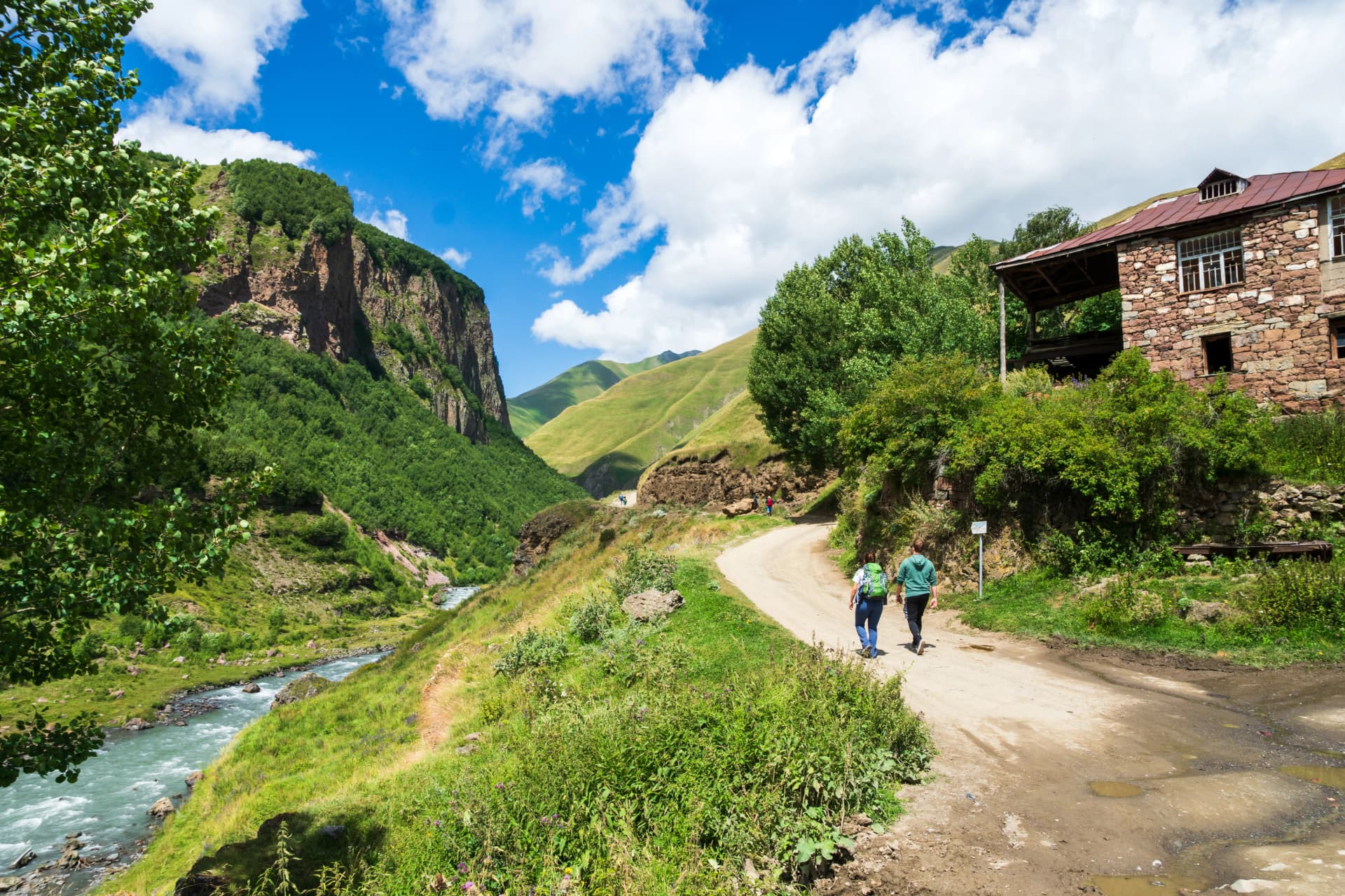 Summer hiking landscape in Georgia, Caucasus. Popular mountain hiking areas in Kazbegi, Truso Gorge area.