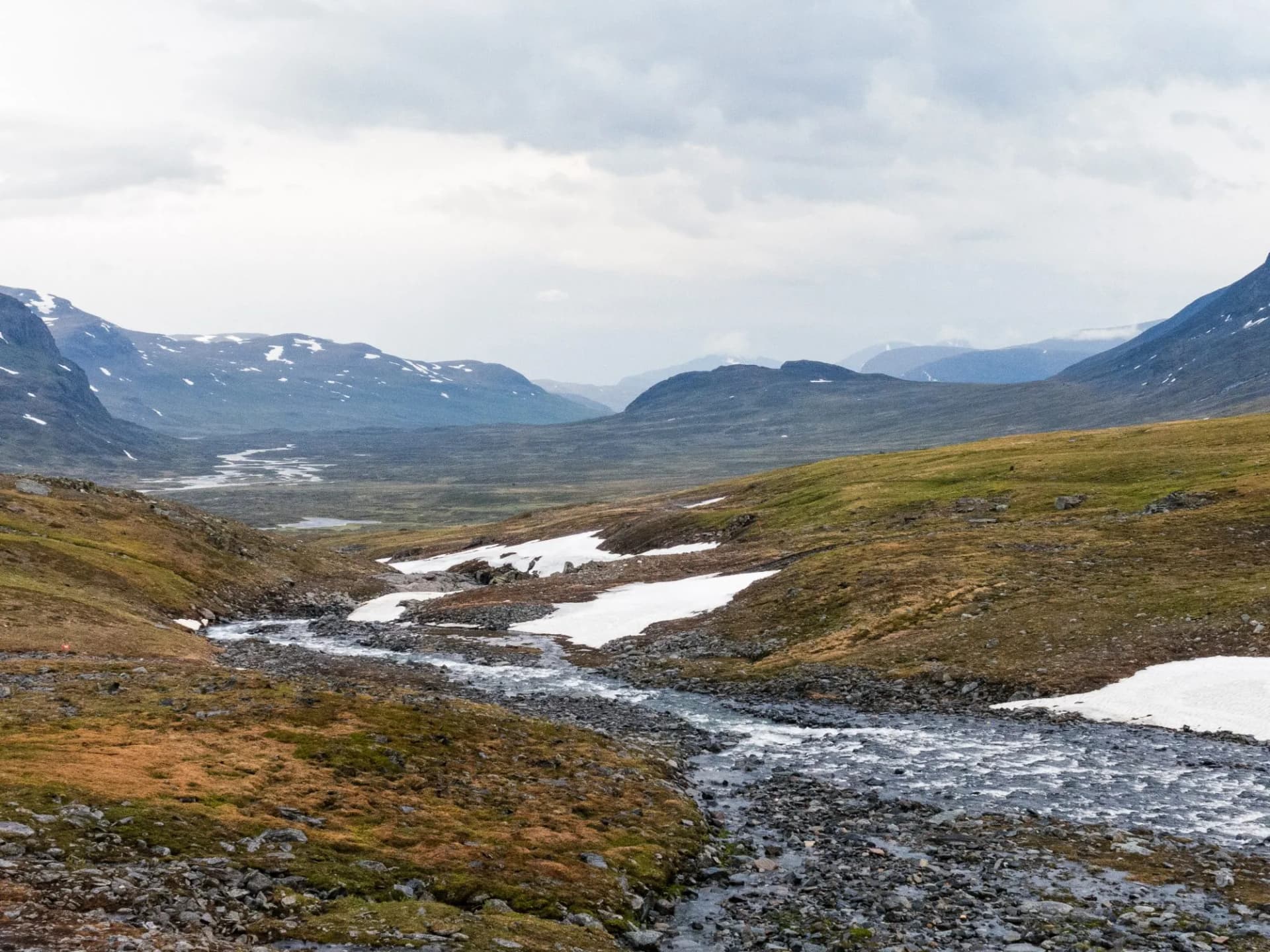 river in the mountains at the tjäktja cabin along kungsleden hiking trail