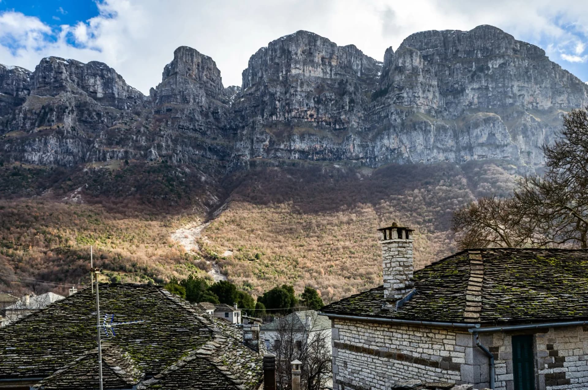 Papingo, the picturesque village of Zagorochoria in Epirus region with impressive view at Astraka towers.