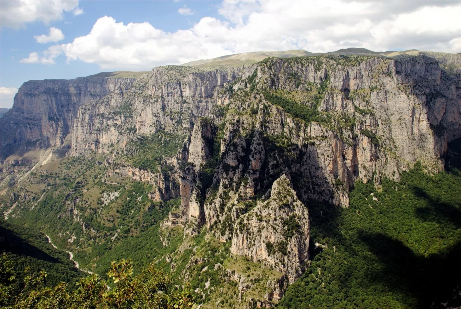 Panoramic view of the Vikos gorge from the viewpoint Oxya of Monodendri village, one of the 45 villages known as Zagoria or Zagorochoria in Epirus region of southwestern Greece.