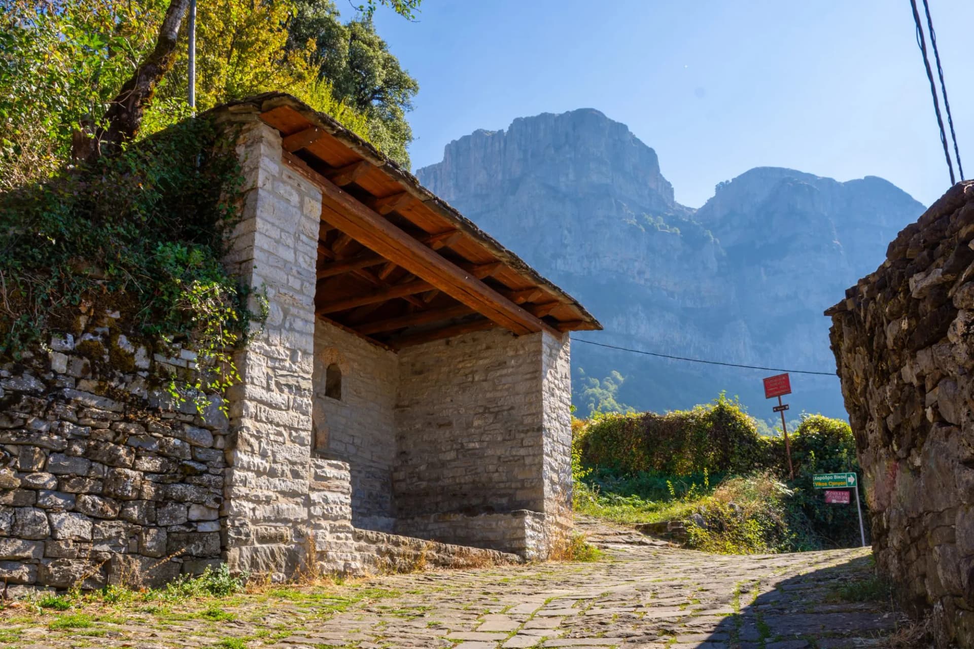 view of towers of Astraka above Papigo stone village ,during fall season in epirus Greece