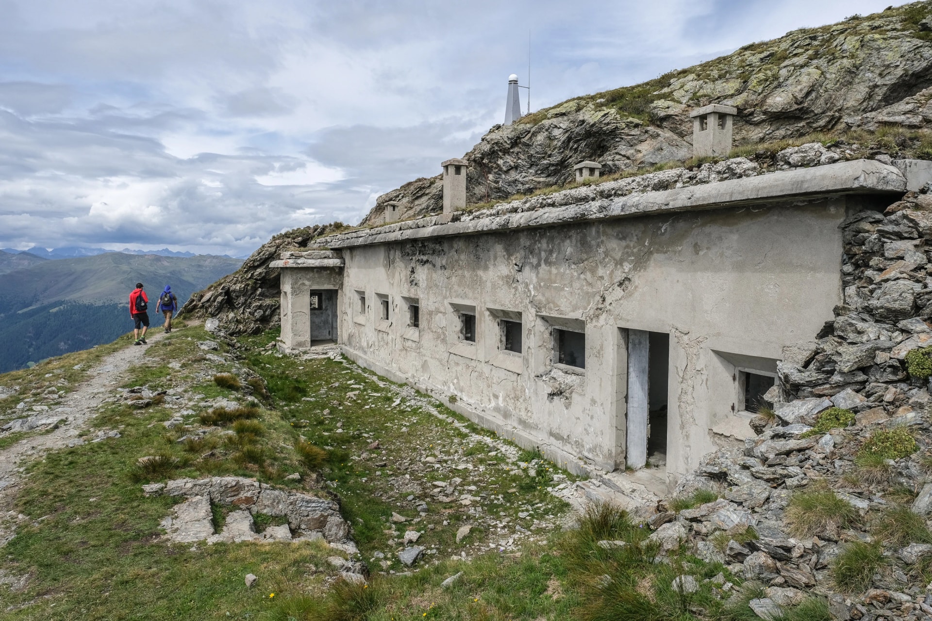 World War I bunkers as seen from Carnic Peace Trail along the Austrian & Italian border on the ascent to Monte Elmo summit, Carnic Alps Highroute, South Tirol, Italy/Austria.