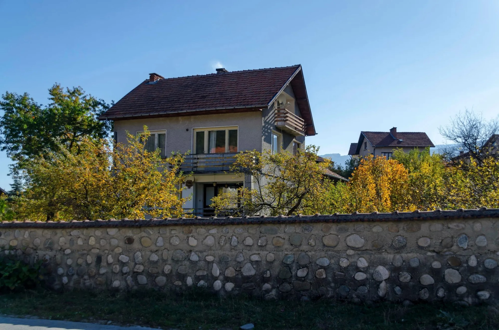 Scene with mountain top, valley, forest, glade and residential district of bulgarian village Govedartsi, Rila
mountain, Bulgaria