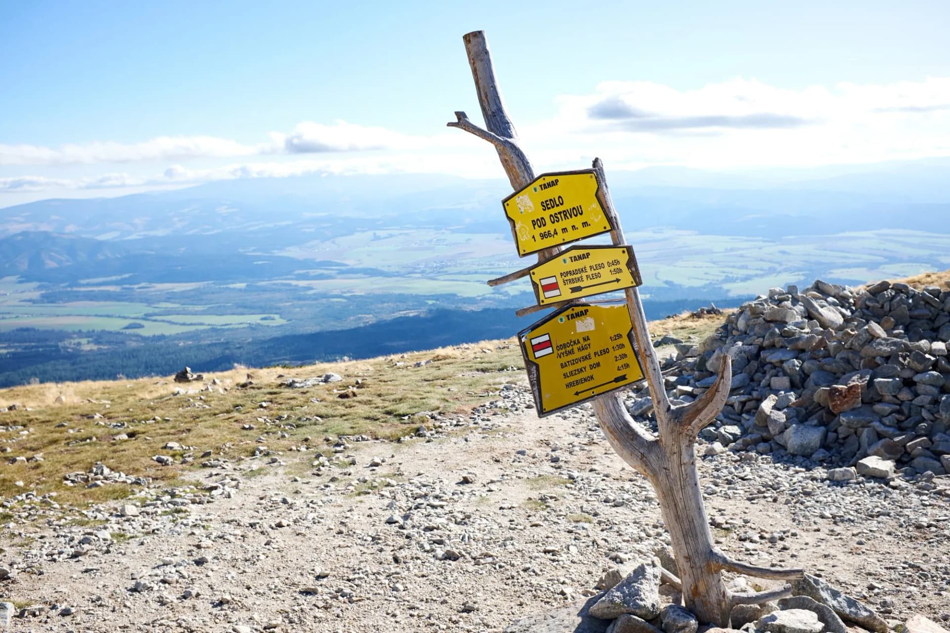 Sign posts on the top of the Ostrva mountain (Sedlo Pod Ostrvou) in High Tatras mountain, Slovakia
