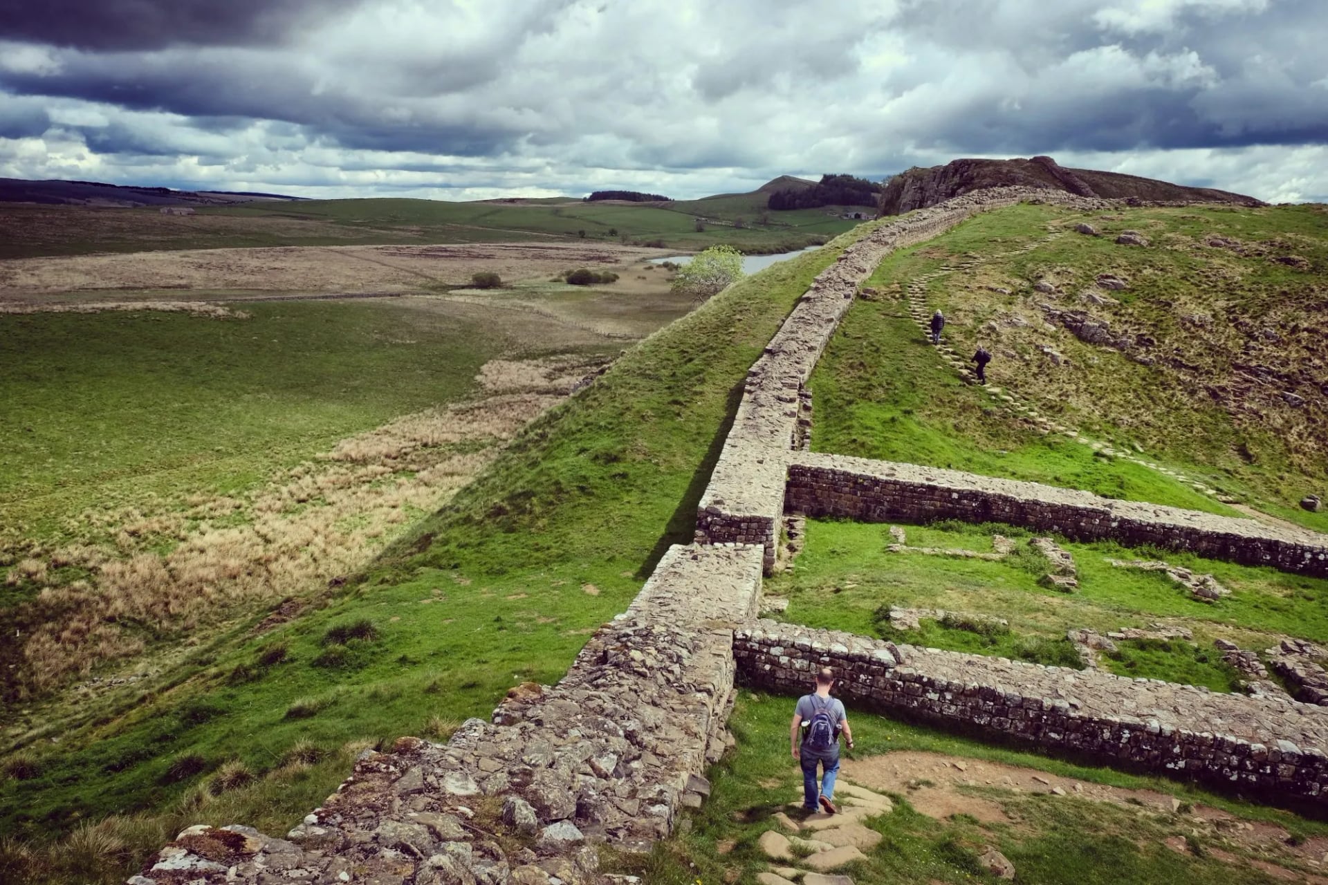 Hadrian's Wall running along the Whin Sill escarpment near Milecastle 39 in Northumberland