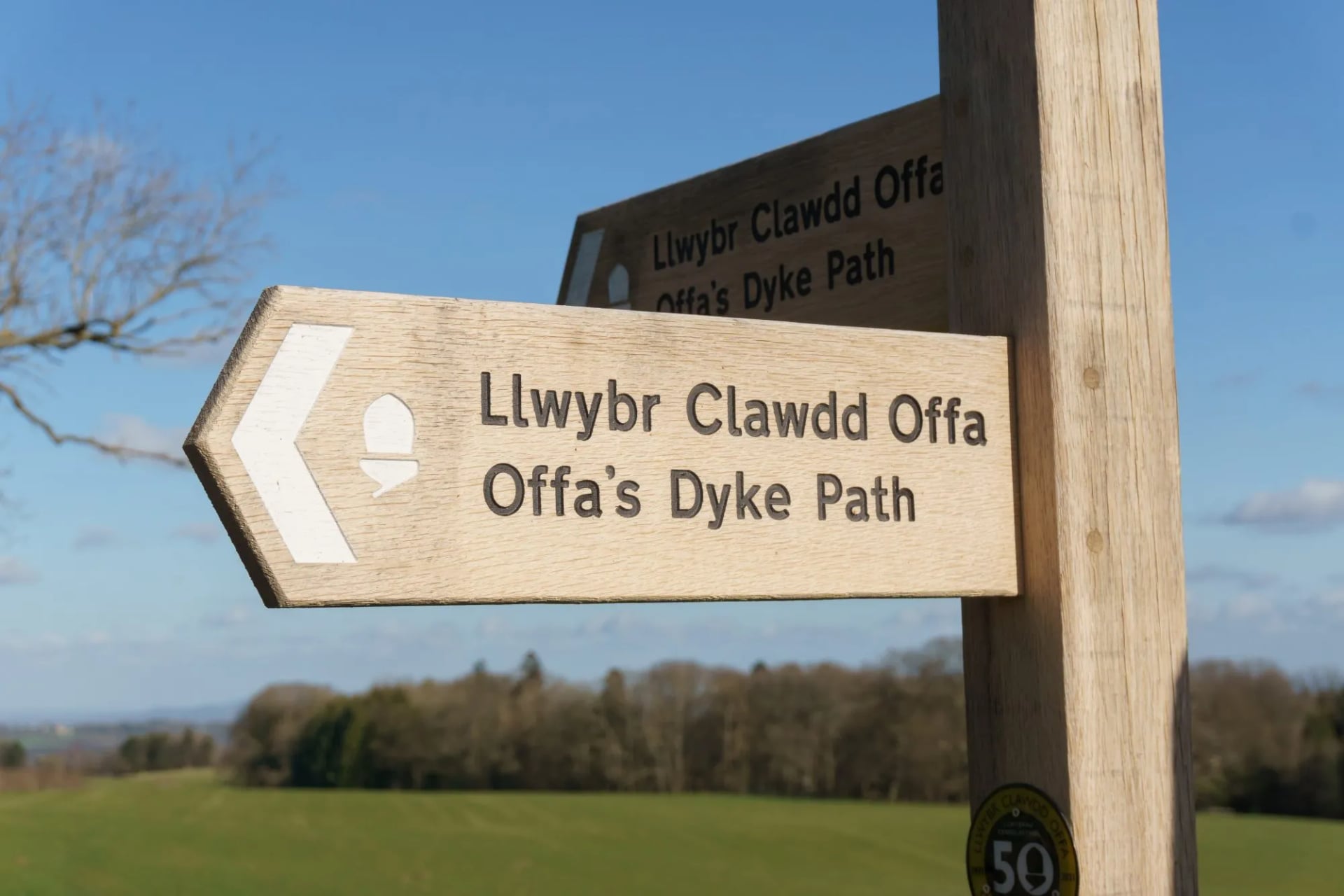Offa's Dyke public footpath sign in English and Welsh languages in Chirk Wales a 177 mile long walking trail in the UK