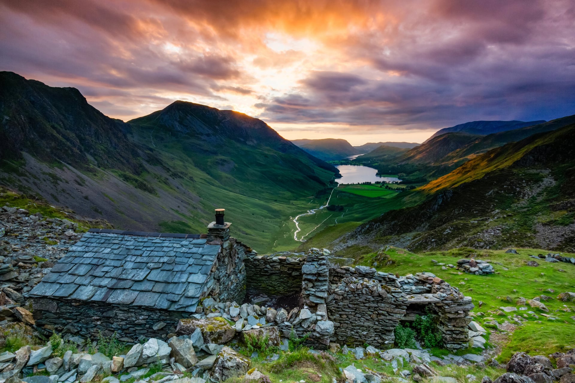 Warnscale Bothy above Buttermere in the Lake District with Crummock Water behind