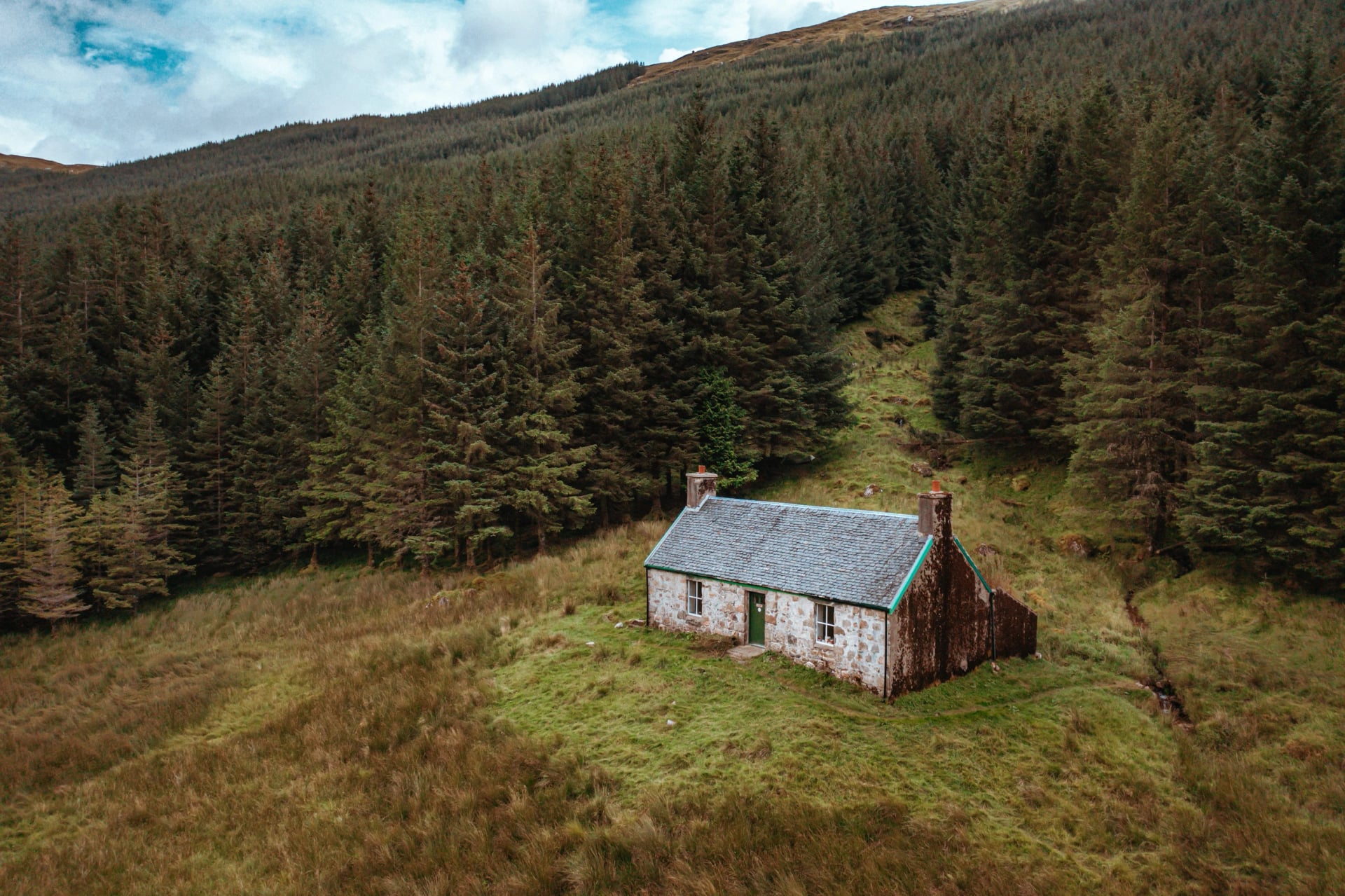 A stone bothy in the Scottish Highlands used as a rest place by hikers
