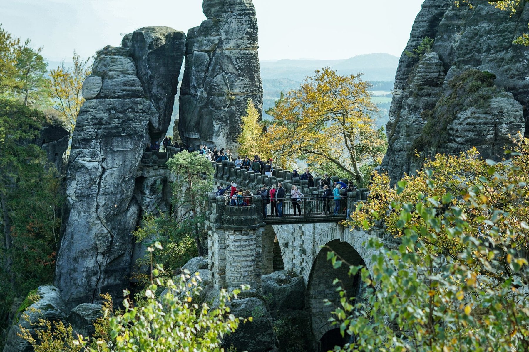 Visitors crossing the Bastei bridge above the Elbe gorge