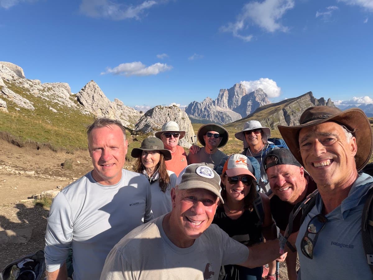 Hikers taking a selfie together in a mountainous landscape
