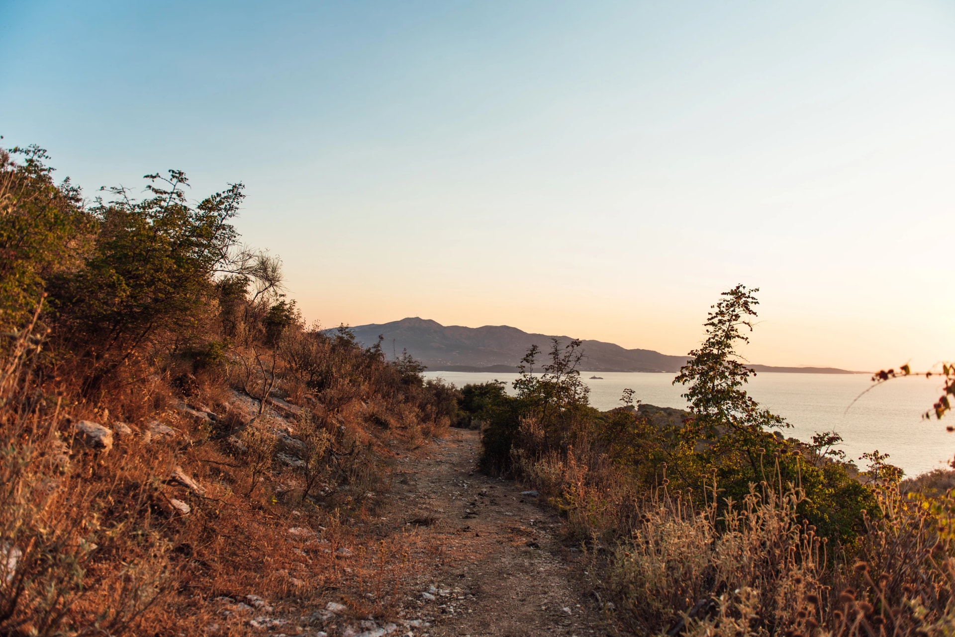 Coastal hiking trail with view toward Corfu from Ksamil Albania