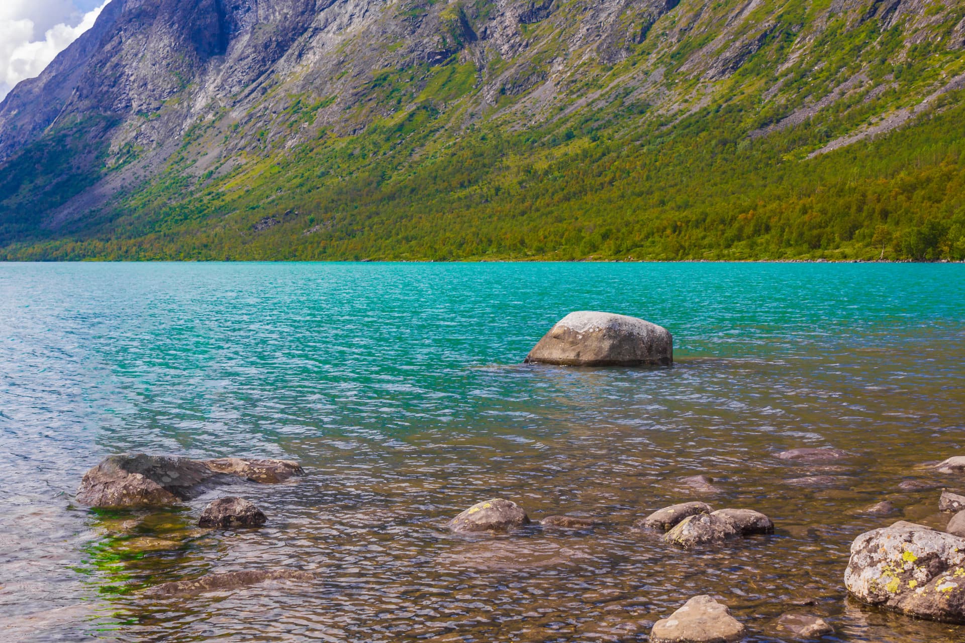Amazing Besseggen Mountain ridge and turquoise lake landscape in Norway.