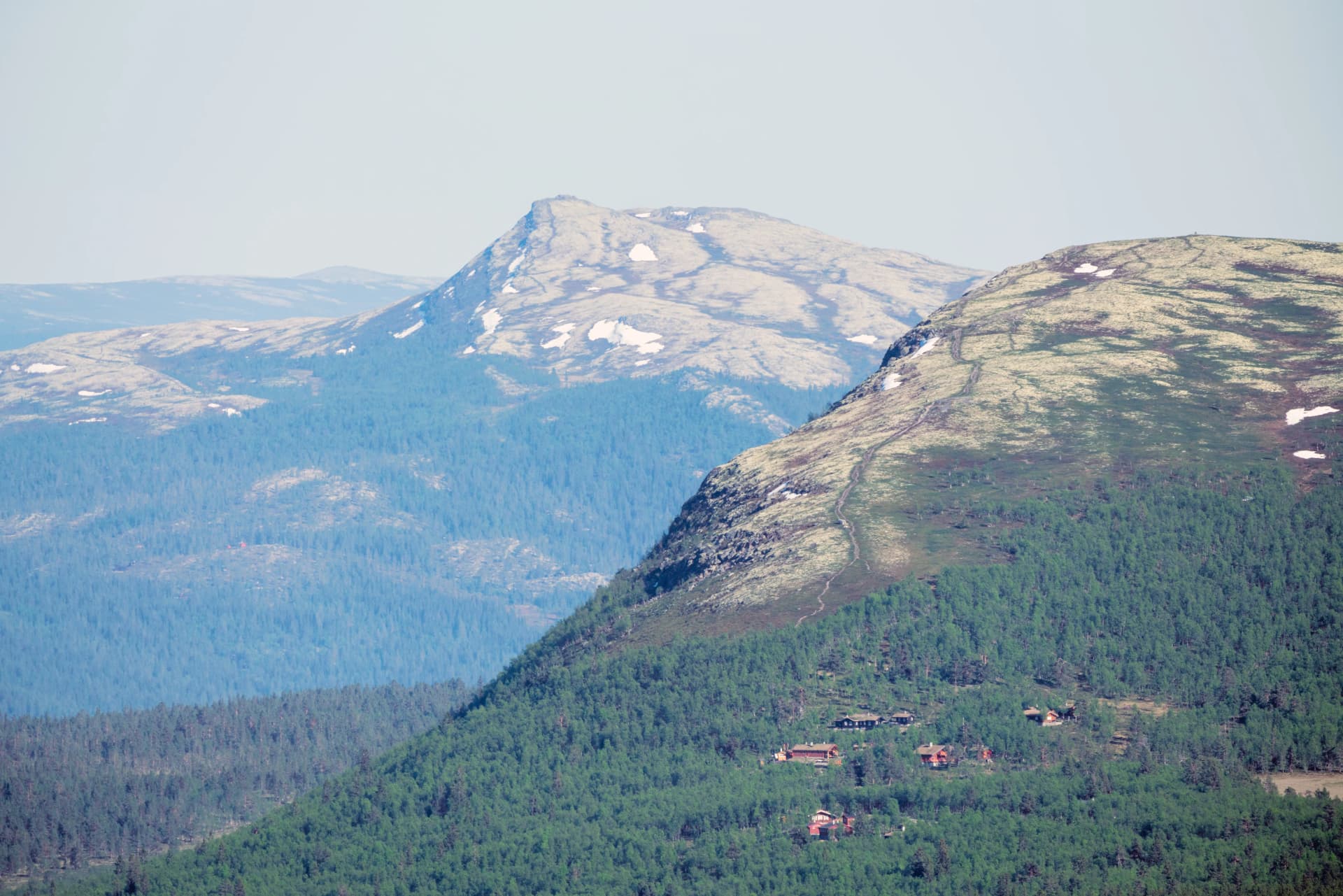Cabins and mountain layers from Kvam and Kvamsfjellet in Norway.