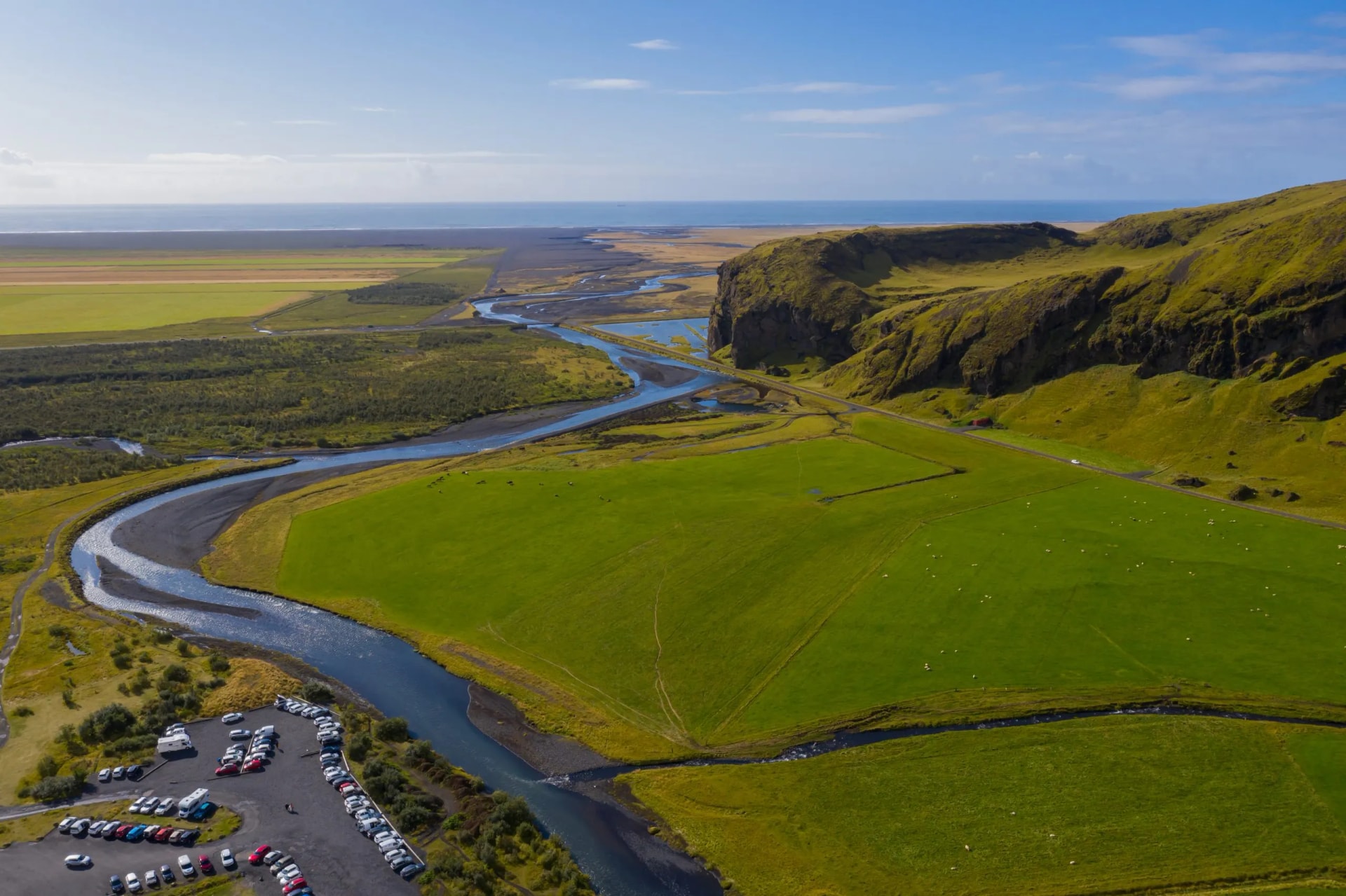Beautiful lush green Landscape of Skoga river valley cascades near Skogafoss waterfall and Skogar end of Fimmvorduhals hiking trail. South Iceland, aerial drone view, september 2019